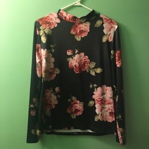 Rose print top on black ground